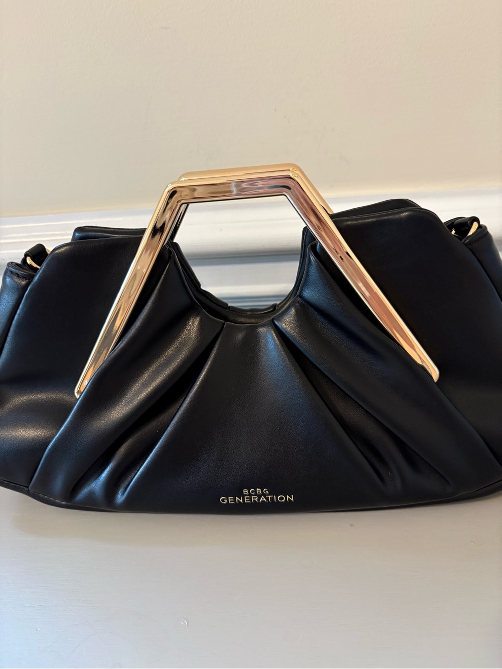 BCBGeneration Black Clutch with Gold Angular Top Handle